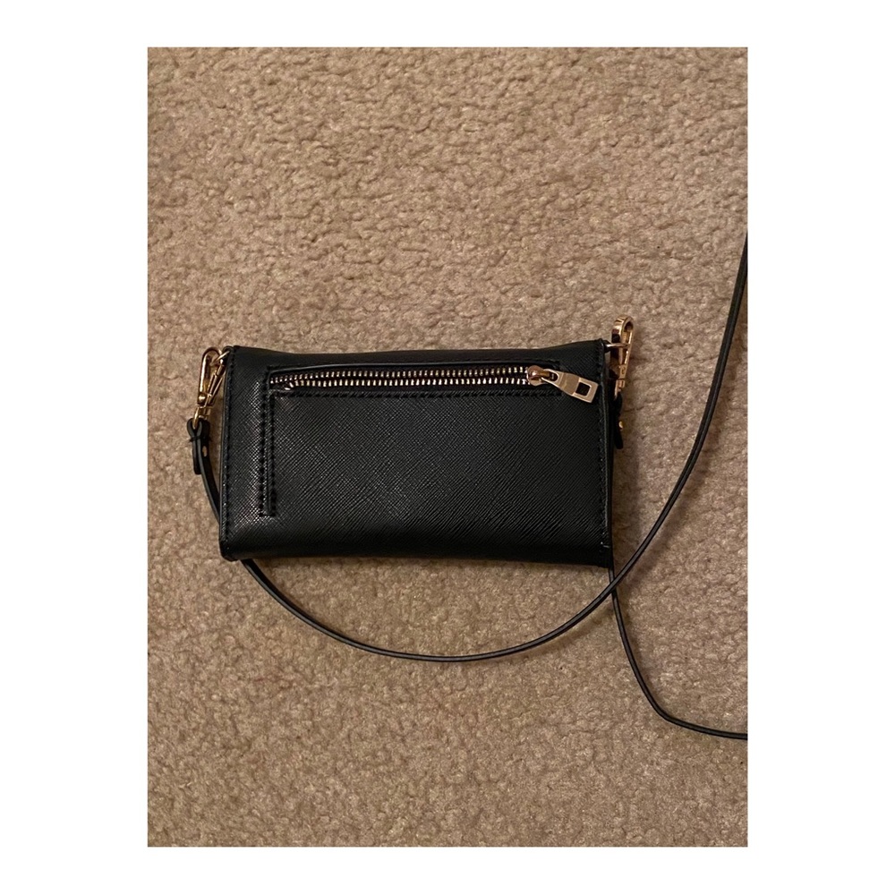 Mirrored cell phone carrying clutch.